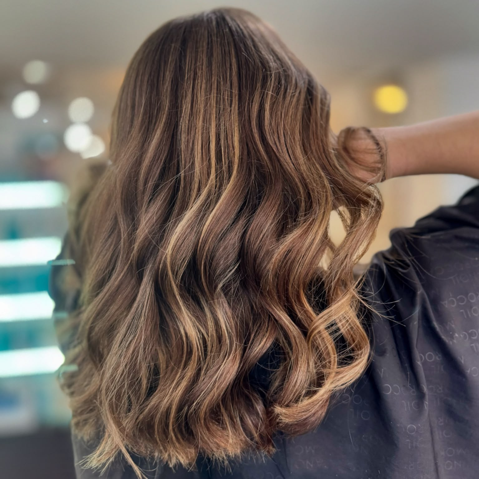 A dimensional brunette balayage at Bonds Aesthetics